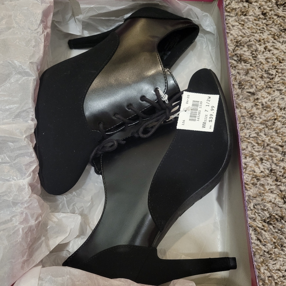 Black high heels, size 7.5